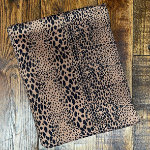*Tiny Black Animal Print on Dark Camel Poly Rayon Jersey. Last Yards - May not be continuous.