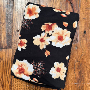 *Peach Floral on Black Rayon Spandex  (LAST YARDS - MAY NOT BE CONTINUOUS)
