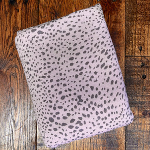 Small Brown Animal Print on Blush Poly Rayon Spandex French Terry.