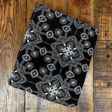 Ivory & Gold Geometric on Black Rayon Spandex. Last Yards - May not be continuous.